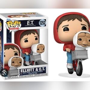 Elliot and ET Funko pop. Good condition. One small dent/tear at opening of box